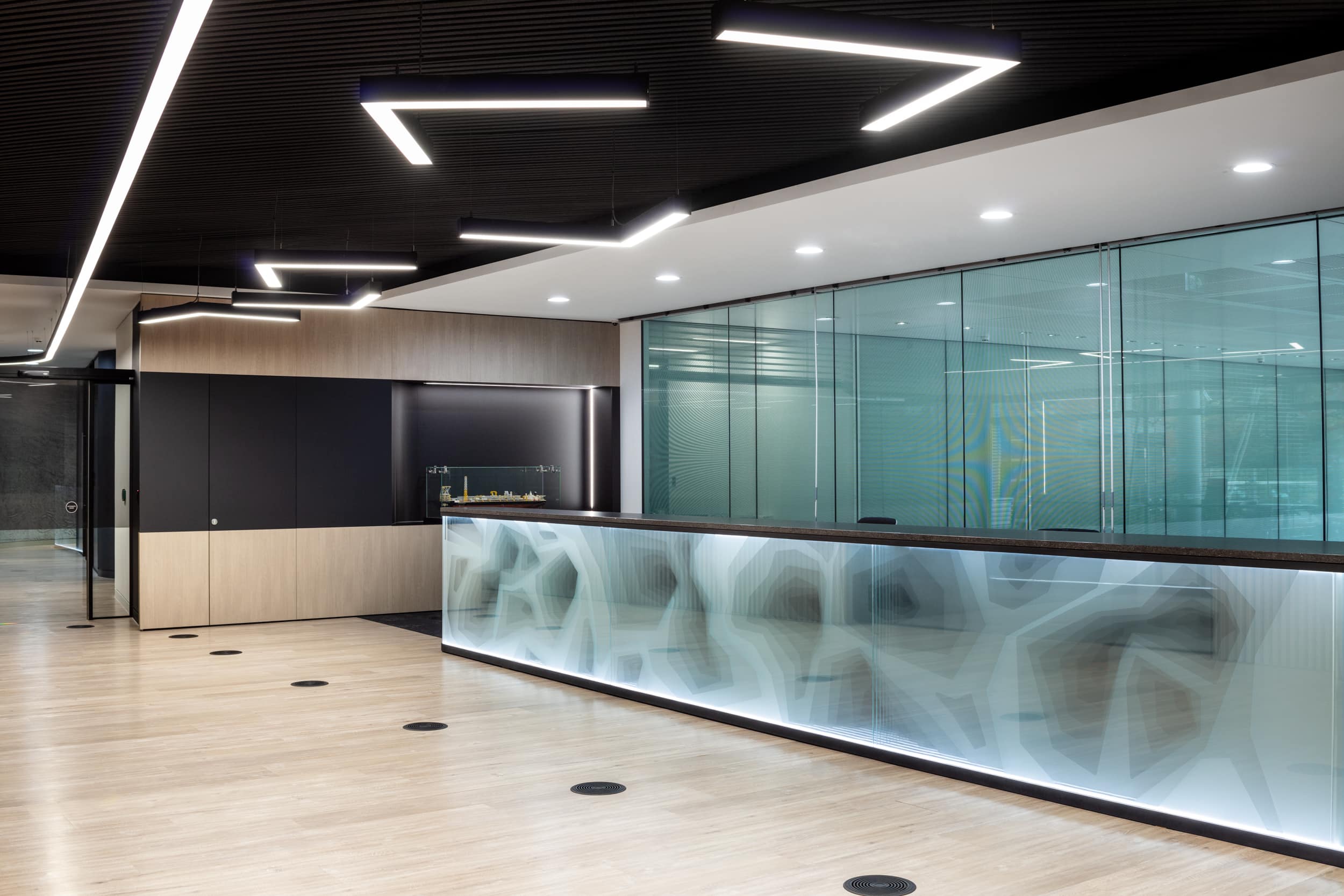 Reception desk at Tullow Oil with feature lighting detail built into the front desk.