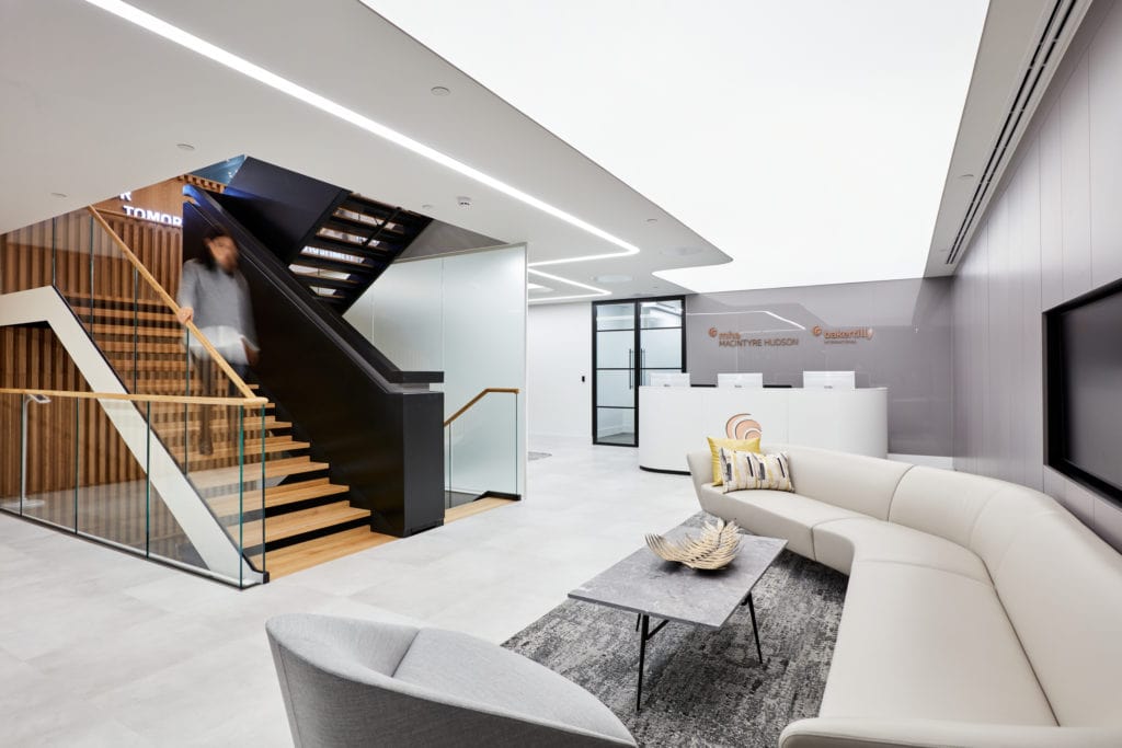 MHA collaborative workspace design by AIS office reception