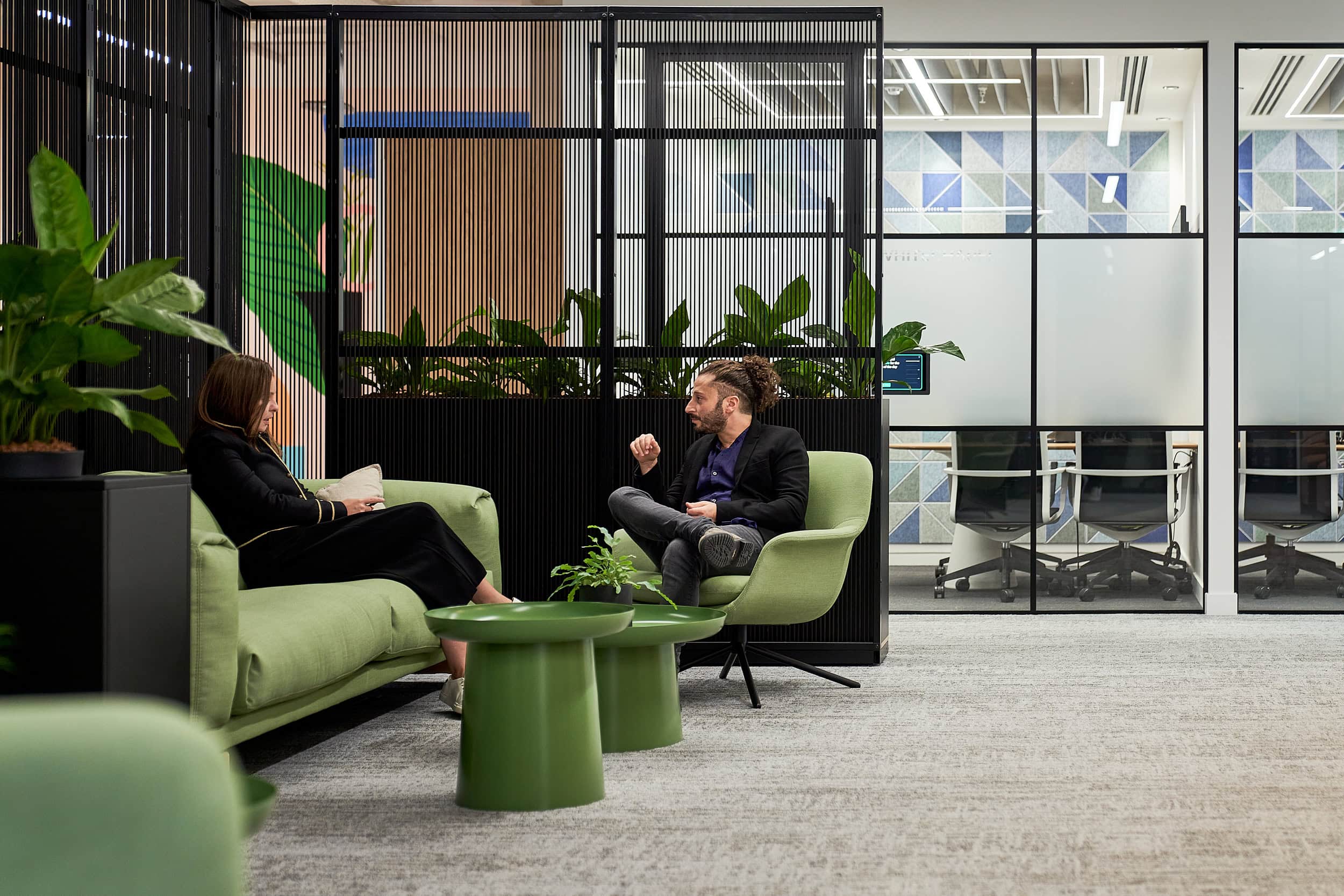 Two people sat together during an AIS Change Management one-on-one