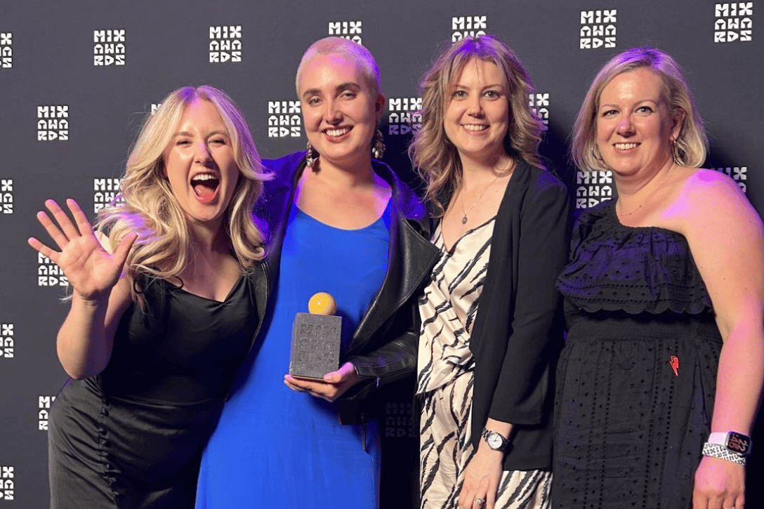 Four women who won the award looking very happy and shocked